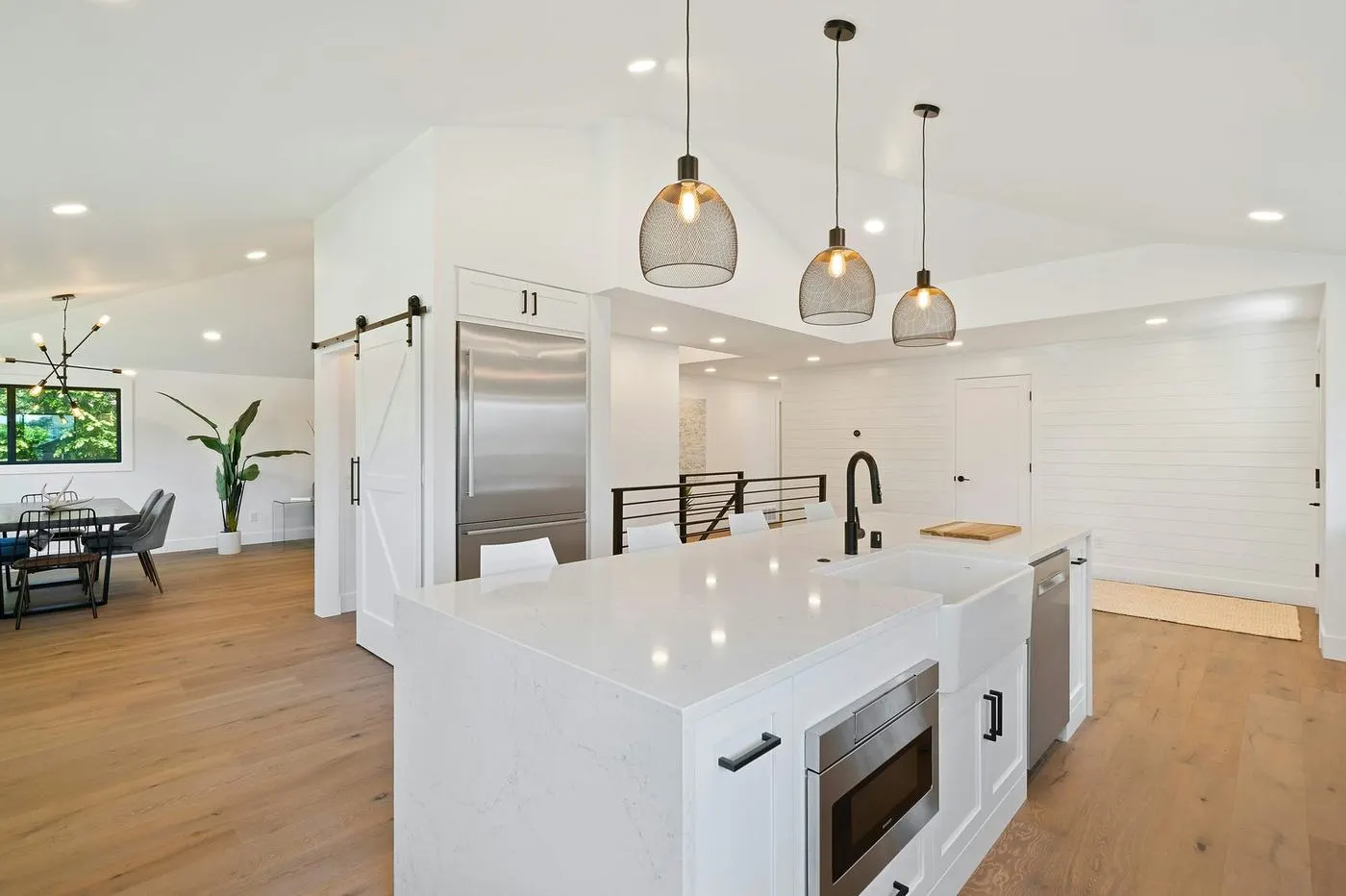 Modern remodeled kitchen with white cabinets